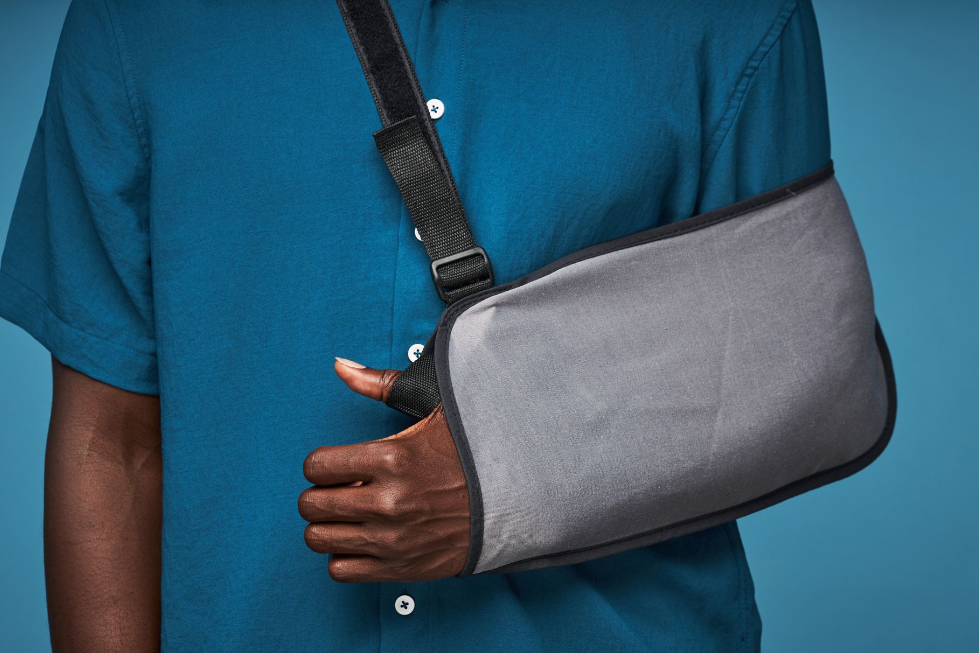 man with broken arm in sling